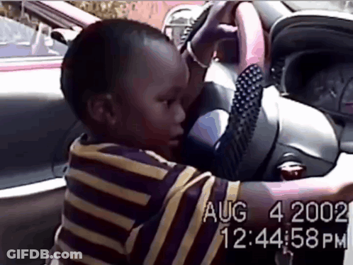 A Video Of A Child Driving A Car Was Taken On Aug 4 2002 At 12:34:58 Pm GIF