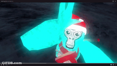 A Video Of A Gorilla Wearing A Santa Hat Is Playing On A Computer Screen GIF