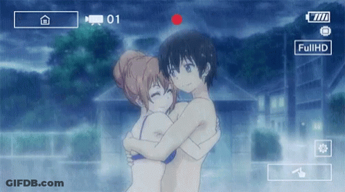 A Video Of A Man And A Woman Hugging Is Being Recorded At Full Hd GIF
