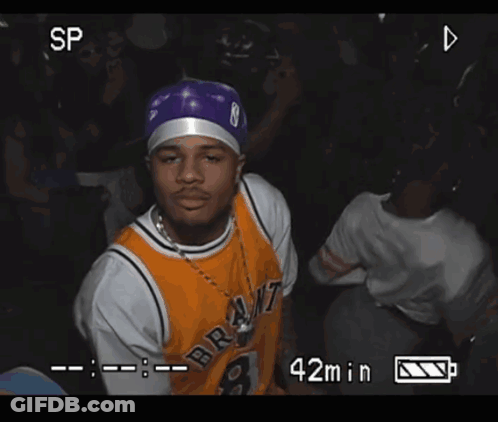 A Video Of A Man Wearing A Bryant Jersey Is Being Recorded GIF