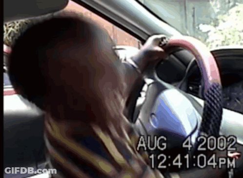 A Video Of A Person Driving A Car With Aug 4 2002 At The Bottom GIF