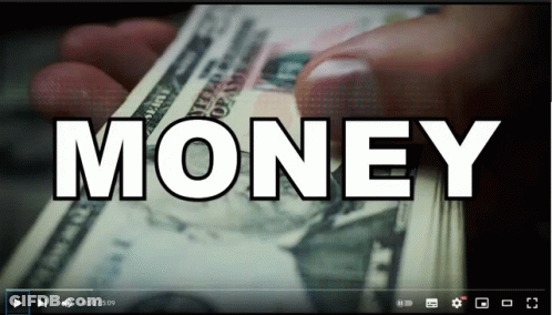 A Video Of A Person Holding A Stack Of Money GIF