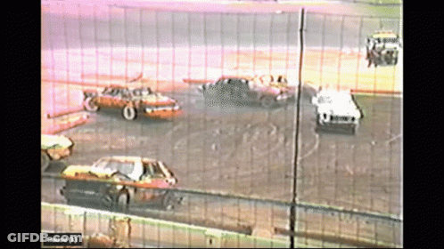 A Video Of A Race With A Pause Button GIF