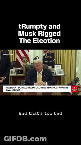 A Video Of Donald Trump Sitting At A Desk GIF