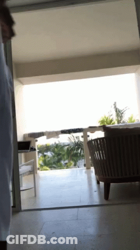 Balcony View With Chair And Laptop GIF