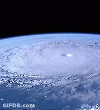 A View Of A Hurricane From Space With A Hole In The Center GIF