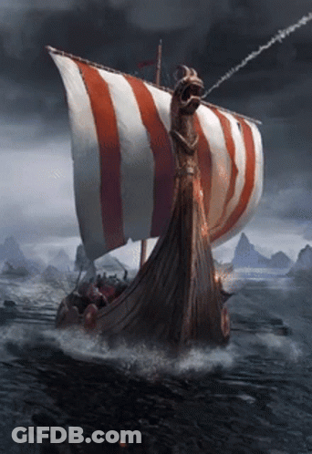 A Viking Ship With A Striped Sail Is Floating In The Ocean GIF