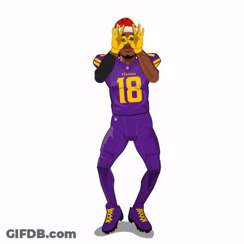 A Vikings Football Player Wearing A Santa Hat And Gloves GIF