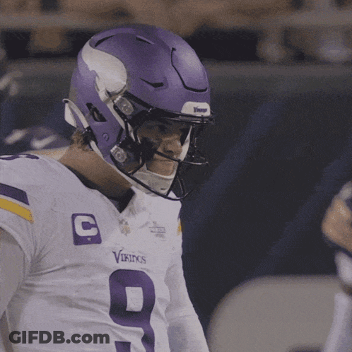 A Vikings Player Wears A Purple Helmet GIF