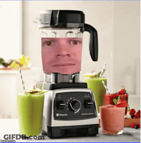 A Vitamix Blender With A Man 'S Face In It GIF