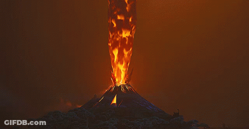 A Volcano With Flames Coming Out Of It 'S Mouth GIF