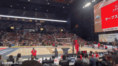 A Volleyball Game Is Being Played In A Stadium With A Sign That Says All The Stands All The Fans GIF