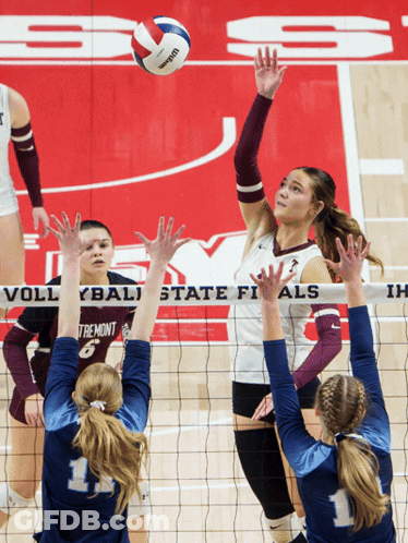 A Volleyball Game Is Being Played In Front Of A Banner That Says State Finals GIF