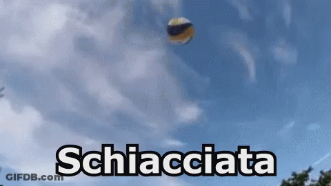 A Volleyball Is Flying Through The Air And The Word Schiacciata Is Visible GIF