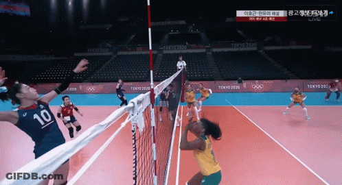 A Volleyball Player With The Number 10 On Her Jersey GIF