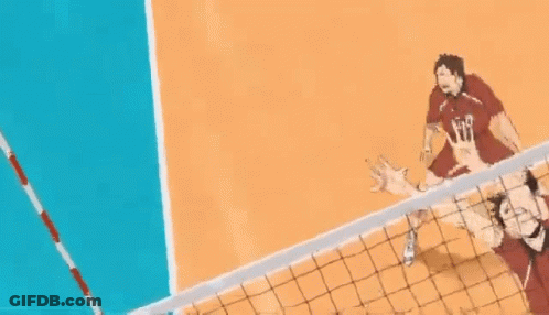 A Volleyball Player With The Number 10 On His Back Is Jumping To Block A Ball GIF