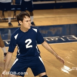 A Volleyball Player With The Number 2 On His Shirt GIF