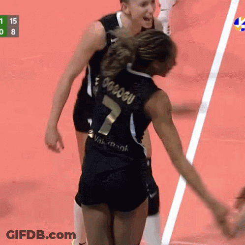 A Volleyball Player With The Number 7 On Her Jersey GIF