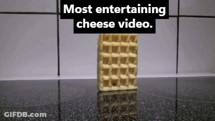 A Waffle With A Bite Taken Out Of It And The Words Most Entertaining Cheese Video Behind It GIF