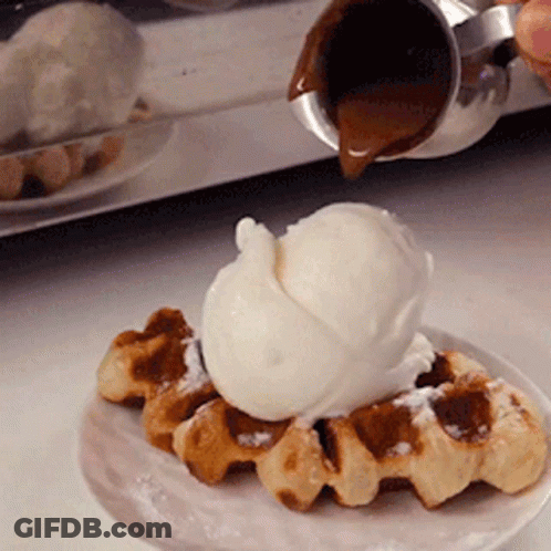 A Waffle With A Scoop Of Ice Cream On It GIF