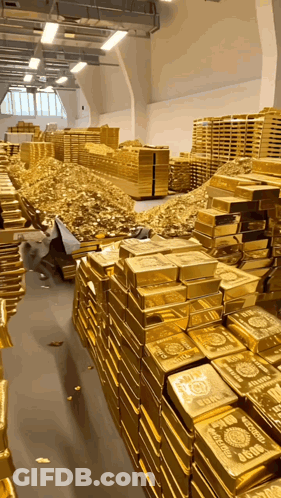 A Warehouse Filled With Lots Of Gold Bars Including One That Says ' Gold ' On It GIF