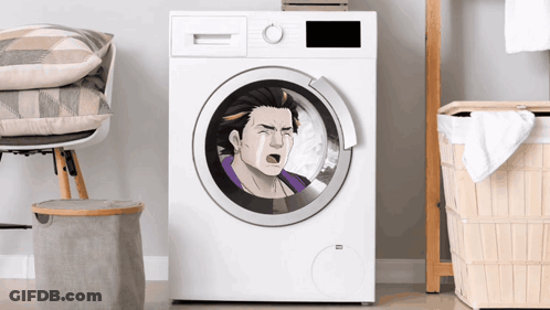 A Washing Machine With A Picture Of A Crying Man In It GIF
