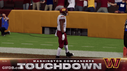 A Washington Commanders Football Player Is Walking On The Field GIF