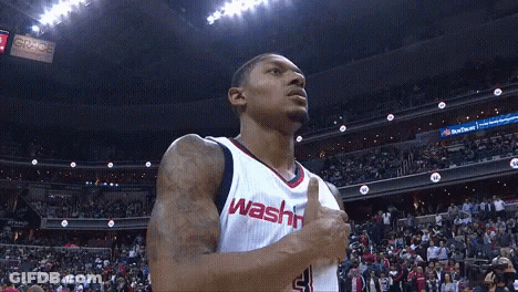 A Washington Wizards Player Giving A Thumbs Up In Front Of A Crowd GIF