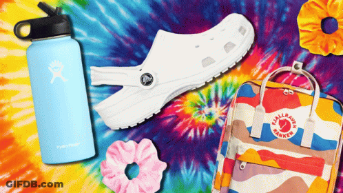 A Water Bottle That Says Hydro Flask Sits Next To A Shoe And A Backpack GIF