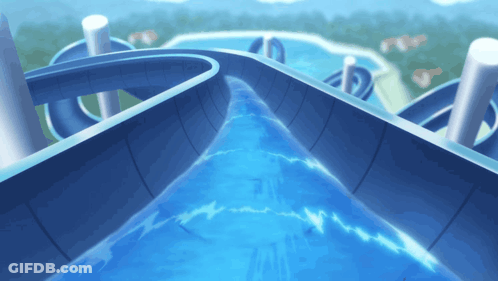 A Water Slide Is Going Down A Hill Of Water GIF