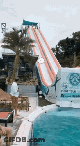 A Water Slide With A Sign That Says Fight Your Waves GIF