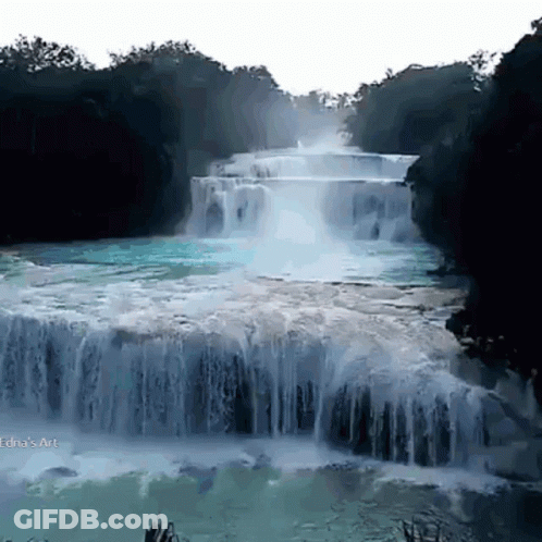 A Waterfall Is Surrounded By Trees And A White Background With The Word Art On The Bottom Right GIF