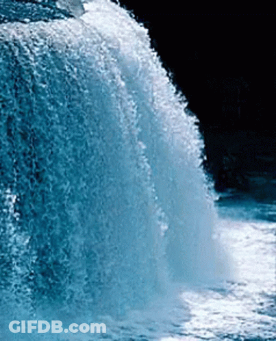 A Waterfall With A Black Background And A Lot Of Water Coming Down It GIF