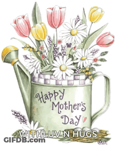 A Watering Can Filled With Flowers For Mothers Day GIF