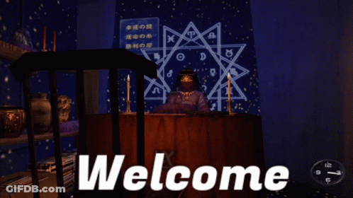 A Welcome Sign With A Woman Sitting At A Table In Front Of A Star GIF
