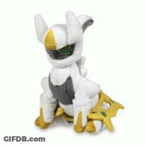 A White And Black Stuffed Animal With A Yellow Star On It . GIF