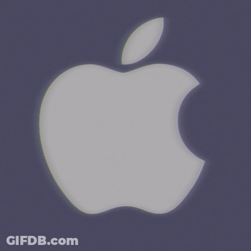 A White Apple On A Green Background With A Leaf GIF