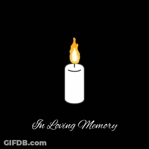 A White Candle With The Words In Loving Memory Written Below It GIF