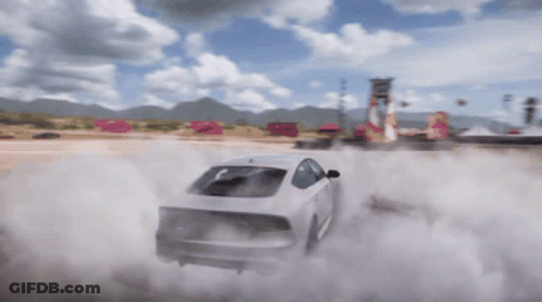 A White Car Is Drifting On A Dirt Road With Smoke Coming Out Of It GIF