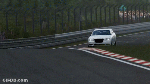 A White Car Is Driving Down A Race Track With A Red White And Blue Stripe On The Side GIF