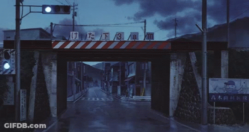 A White Car Is Driving Under A Bridge With A Sign Above It That Says 3 GIF