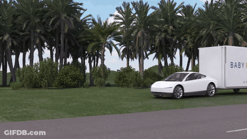 A White Car Is Pulling A White Box That Says Baby GIF