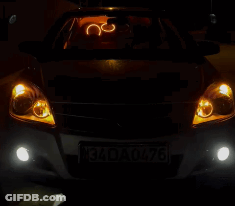 A White Car With A License Plate That Says 34Da 0476 GIF