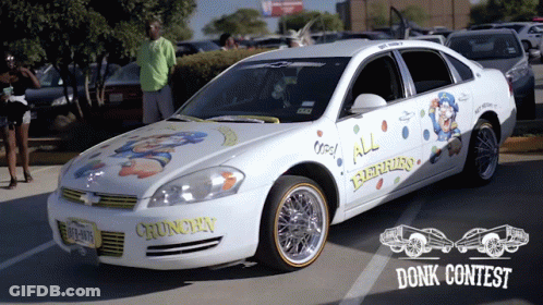 A White Car With A License Plate That Says ' Crunchy ' On It GIF