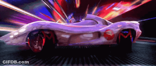 A White Car With A Red Logo On The Side Is Driving Down The Road GIF