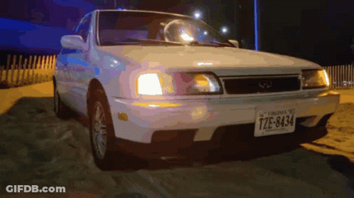A White Car With A Virginia License Plate Tze-8434 GIF
