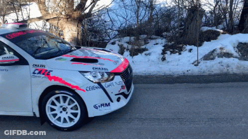 A White Car With Chazel Written On The Side GIF