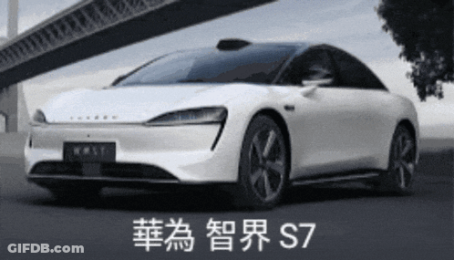 A White Car With Chinese Writing On The Side Is Parked Under A Bridge GIF