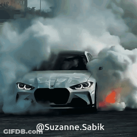 A White Car With Smoke Coming Out Of It And The Words @Suzanne.sabik On The Bottom GIF