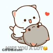 A White Cat Is Hugging A Gray Cat With The Words `` Miss You A Lot '' . GIF